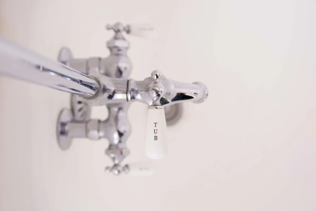 Close-up view of bathroom plumbing installed by Keen Bathrooms, highlighting expert craftsmanship and quality.