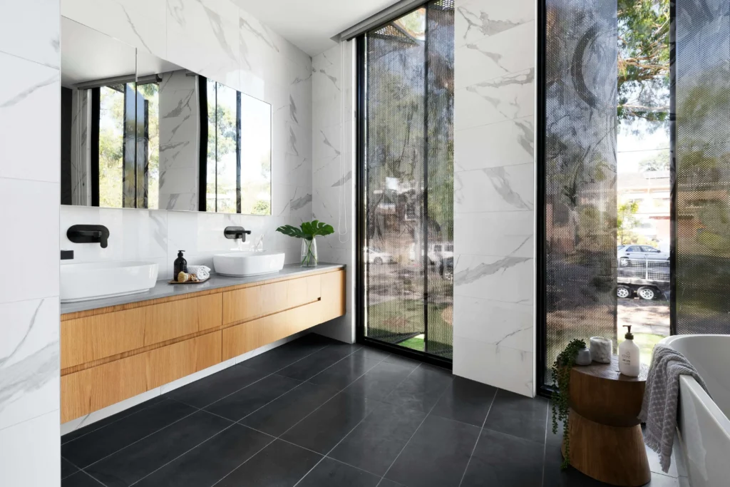 Modern bath tub with sleek design and contemporary fixtures in a stylish bathroom setting. This is bathroom renovations Hamilton homeowners trust